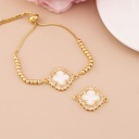 Enlace de trebol con zirconias baño 18k