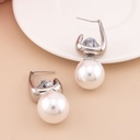 Aretes triple uso con perla y zirconias baño 18k