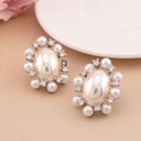 Aretes de perlas con zirconias baño 18k