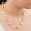 Collar de perlas barrocas y perlas de rio baño 18k