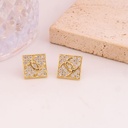 Aretes stud de marca con zirconias baño 18k