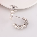 Argollas de marca con perlas y zirconias baño 18k plat