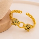 Brazalete de marca con zirconias baño 18k