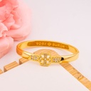 Brazalete de marca con zirconias baño 18k