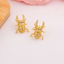 Aretes stud de escarabajos con zirconias baño 18k