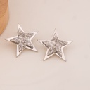 Aretes stud de estrella solidos baño 18k