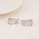Aretes stud coquette solidos baño 18k