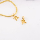 Charm palomita madre perla baño 18k