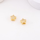 Separador de estrella con zirconias baño 18k