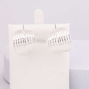 Aretes stud tipo argollas baño 18k plat