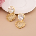 Aretes colgantes de corazon con zirconias baño 18k