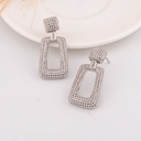 Aretes colgantes con zirconias baño 18k plat