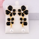 Aretes colgantes de flor baño 18k negros