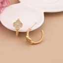 Argolla de trebol con zirconias baño 18k