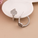 Argolla de trebol con zirconias baño 18k plat