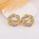 Aretes stud con zirconias baño 18k