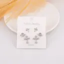 Set de piercings de cruces con zirconias baño 18k plat