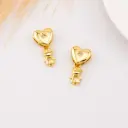 Dije de corazon con colgante de niño baño 18k