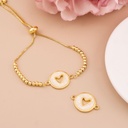 Enlace de corazon con concha nacar baño 18k