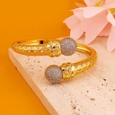 Brazalete doble tono con zirconias baño 18k
