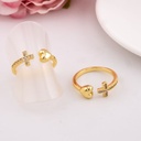 Anillo ajustable de cruz con zirconias baño 18k