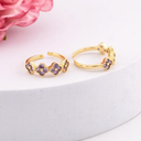 Anillo ajustable de trebol con zirconias baño 18k