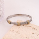 Brazalete de marca con zirconias baño 18k