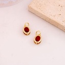 Dije ovalado con zirconia baño 18k rojo