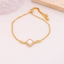 Pulsera ajustable de trebol con zirconias y madre perla baño 18k
