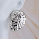 Aretes caracol plateado baño 18k