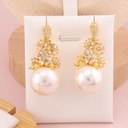 Aretes colgantes perla con zirconias baño 18k