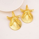 Aretes estrella de mar baño 18k