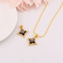 Dije de trebol con madre perla en micropave