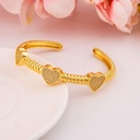 Brazalete de corazon con zirconias baño 18k
