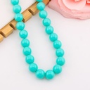 Collar bola chicle aqua en concha nacar baño 18k