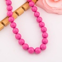 Collar bola chicle magenta en concha nacar baño 18k