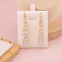 Aretes colgantes premium con zirconias baño 18k