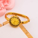 Reloj vintage redondo estilo brazalete en acero inoxidable