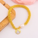 Pulsera elastica religiosa baño 18k
