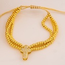 Pulsera ajustable con separador de cruz baño 18k