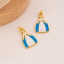 Dije muñequita folklorica de Honduras baño 18k