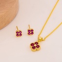 Aretes y dije de trebol con zirconias baño 18k