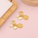 Charm religioso con tres colgantes baño 18k