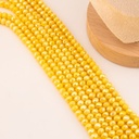 Cristal jade de 6mm facetado color amarillo pastel con recubrimiento Aura/AB