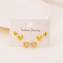 Set de aretes de corazones con zirconias baño 18k