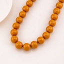 Collar bola chicle marron en concha nacar 14mm baño 18k