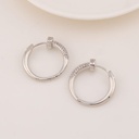 Argollas de marca con zirconias baño 18k