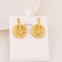 Aretes colgantes de marca con zirconias baño 18k